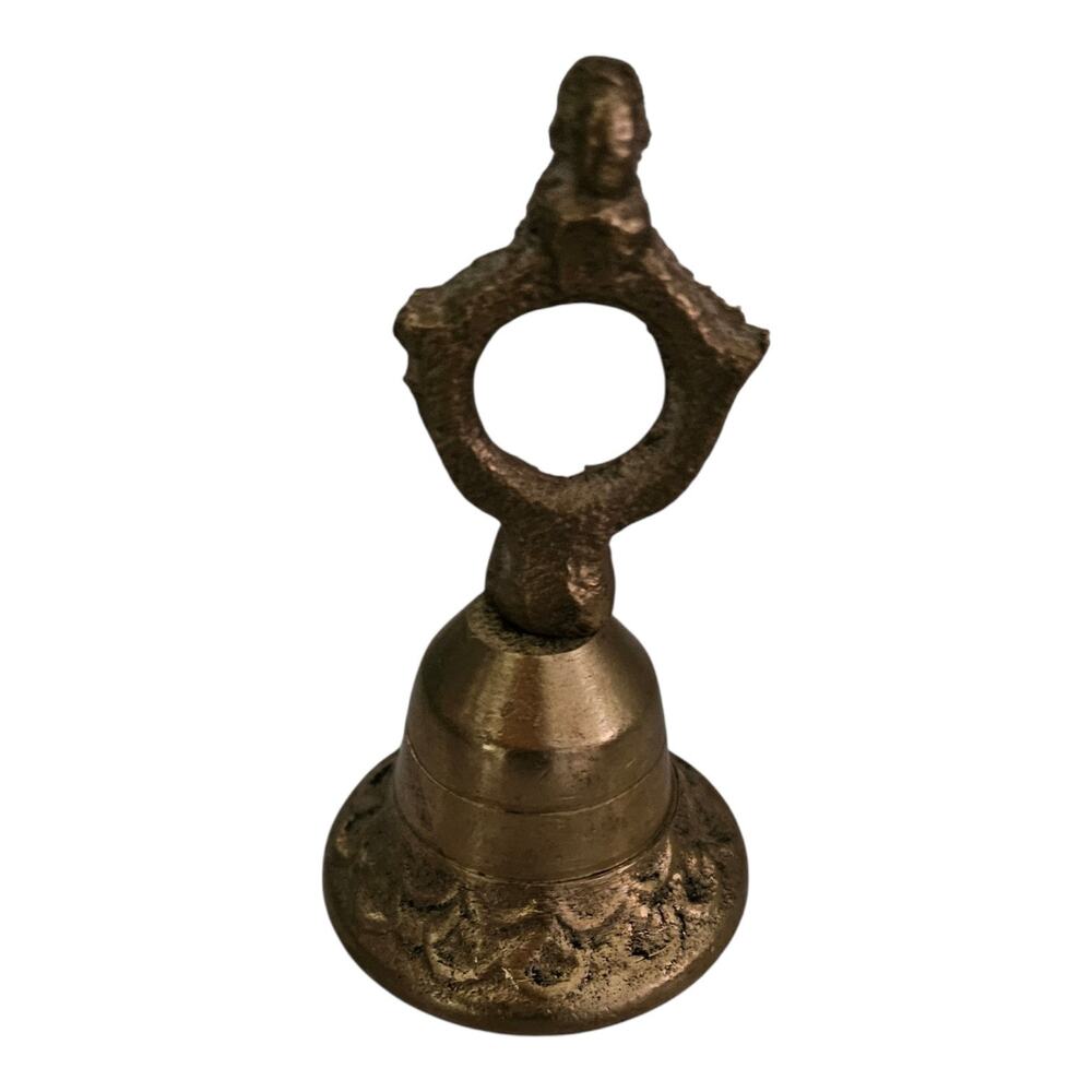 Vintage Brass Hand Bell Carved Figural Handle Embossed Base Altar Decor 5 Inch